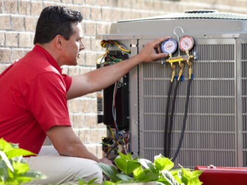 HVAC Technician performing AC Maintenance in Stuart, FL